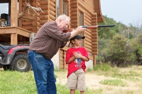 Great Grandpa showing him how it's done! He hit the target right away!