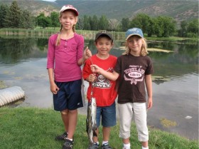 Casey and his cousins with their catches for the day.