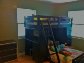 It is hard to see in this lighting, but the room is now a nice sage green color.