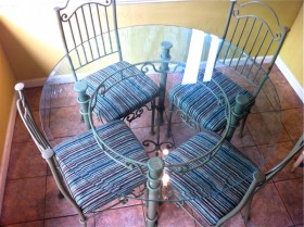 Here is the table all finished.  Spray painted base and chairs and reupholstered chairs.