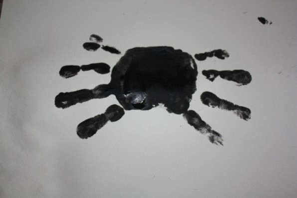 Handprint black spider