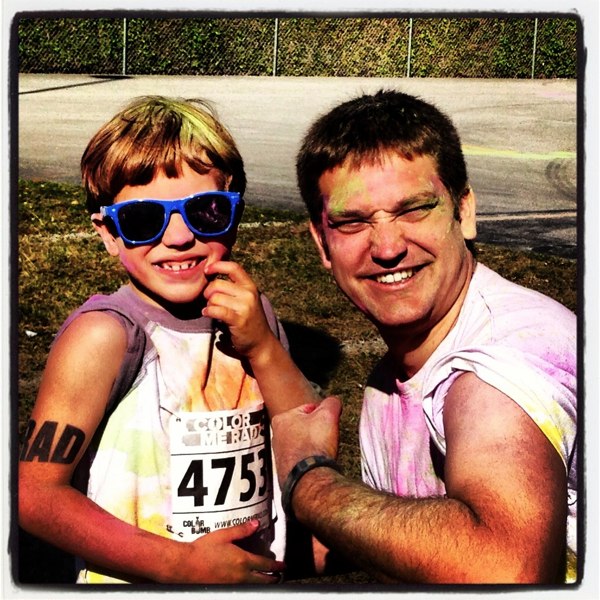 Casey and his Daddy after the race!