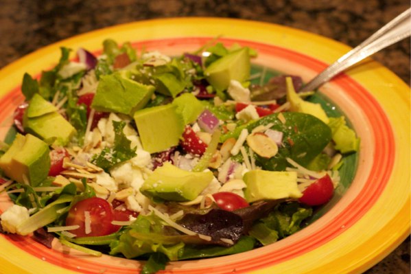 Goes perfect with this salad!  MIxed greens, tomatoes, avocado, feta, parmesan, and sliced almonds!